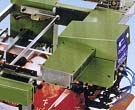 Rear edge sheet feeder in operation